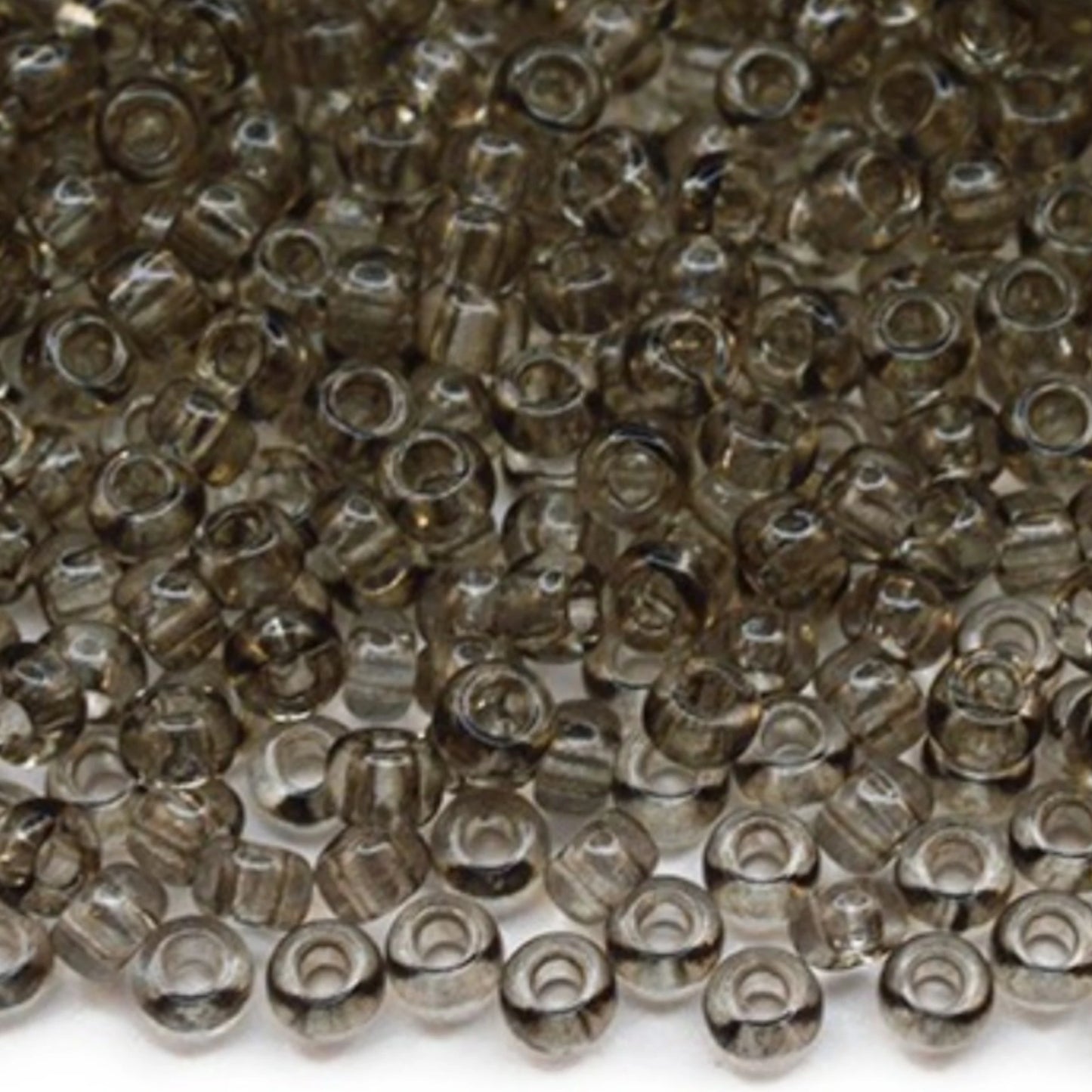 10/0 01141 Perline di vetro ceco Preciosa Rocaille 2,3 mm. Cristallo grigio - colorazione Solgel.