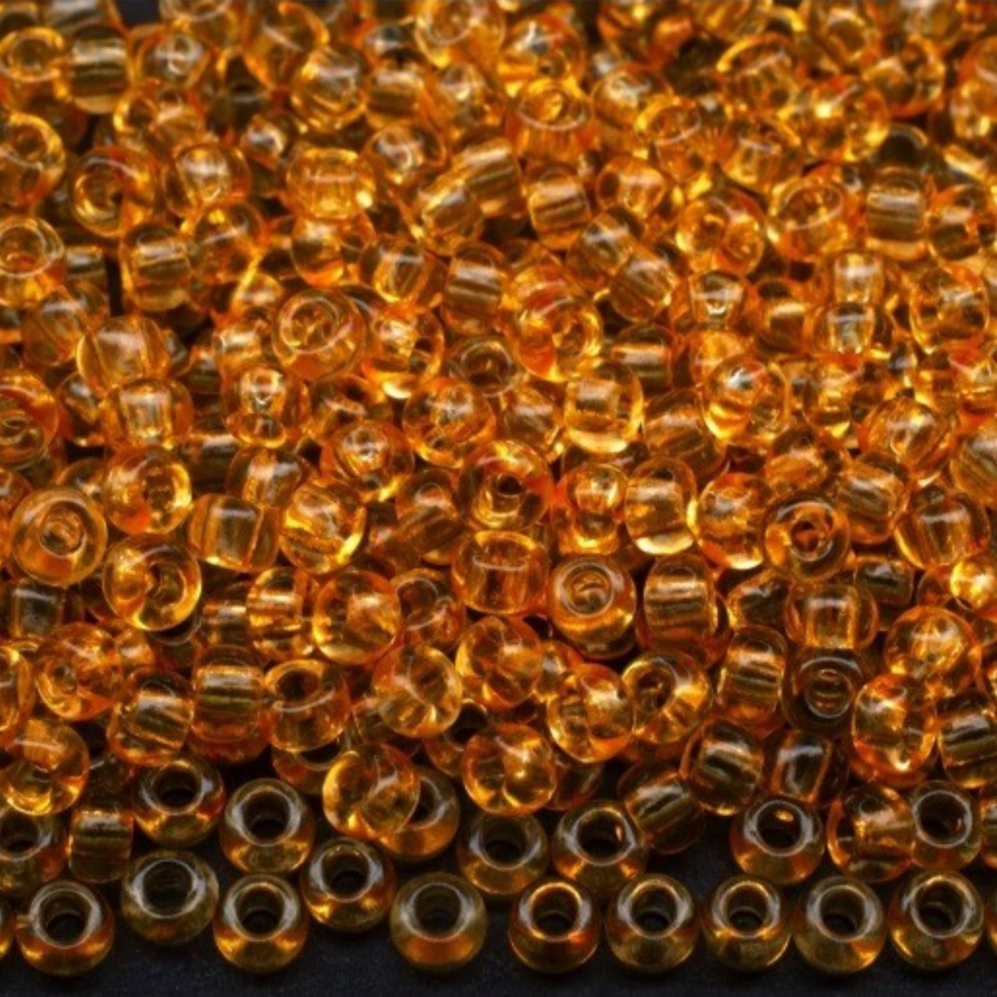 10/0 01183 Preciosa tsjekkiske glass små perler rocailleperler 2,3 mm. Oransje krystall - solgel farget.