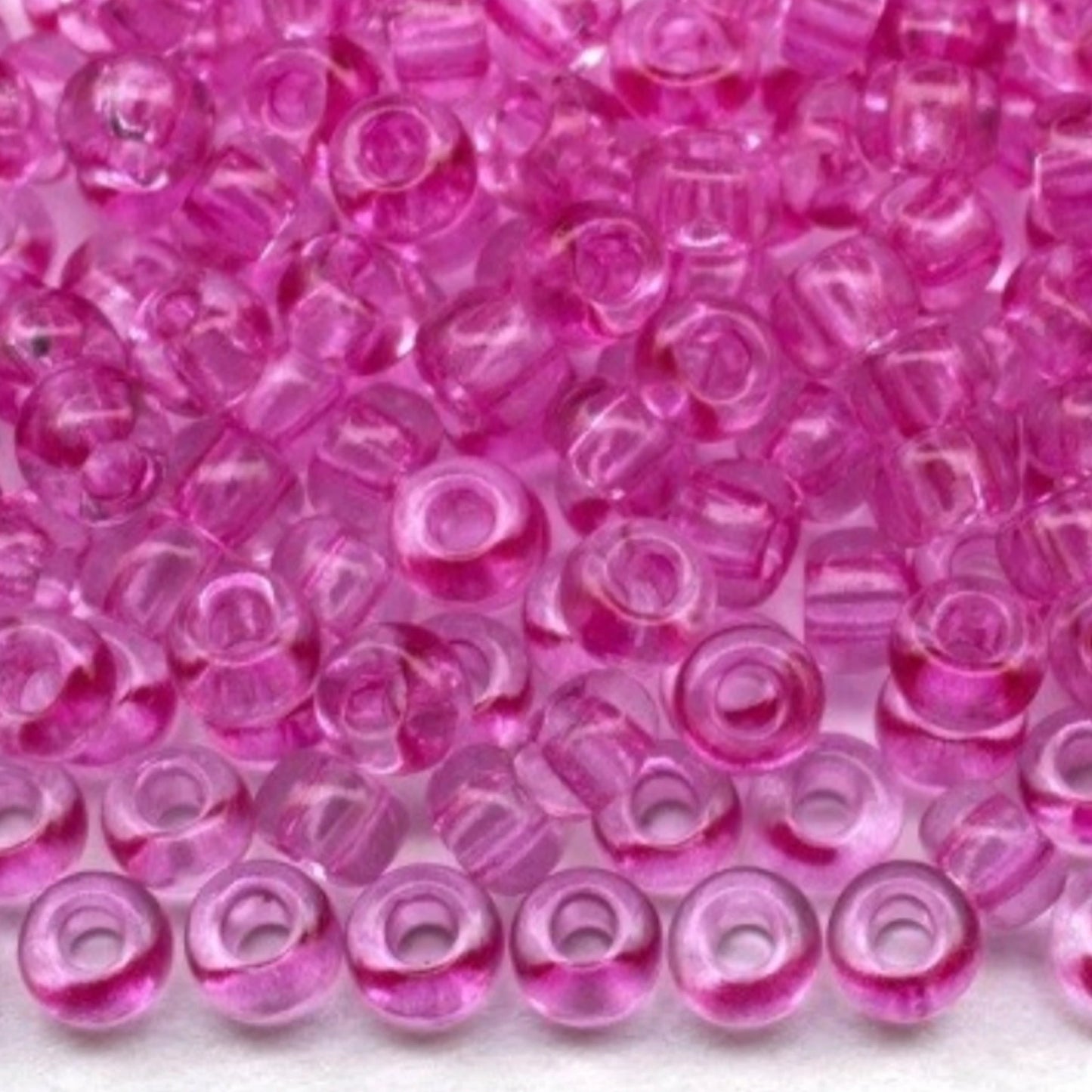 10/0 01192 Preciosa tsjekkiske glass små perler rocailleperler 2,3 mm. Rosa krystall - solgel farget.