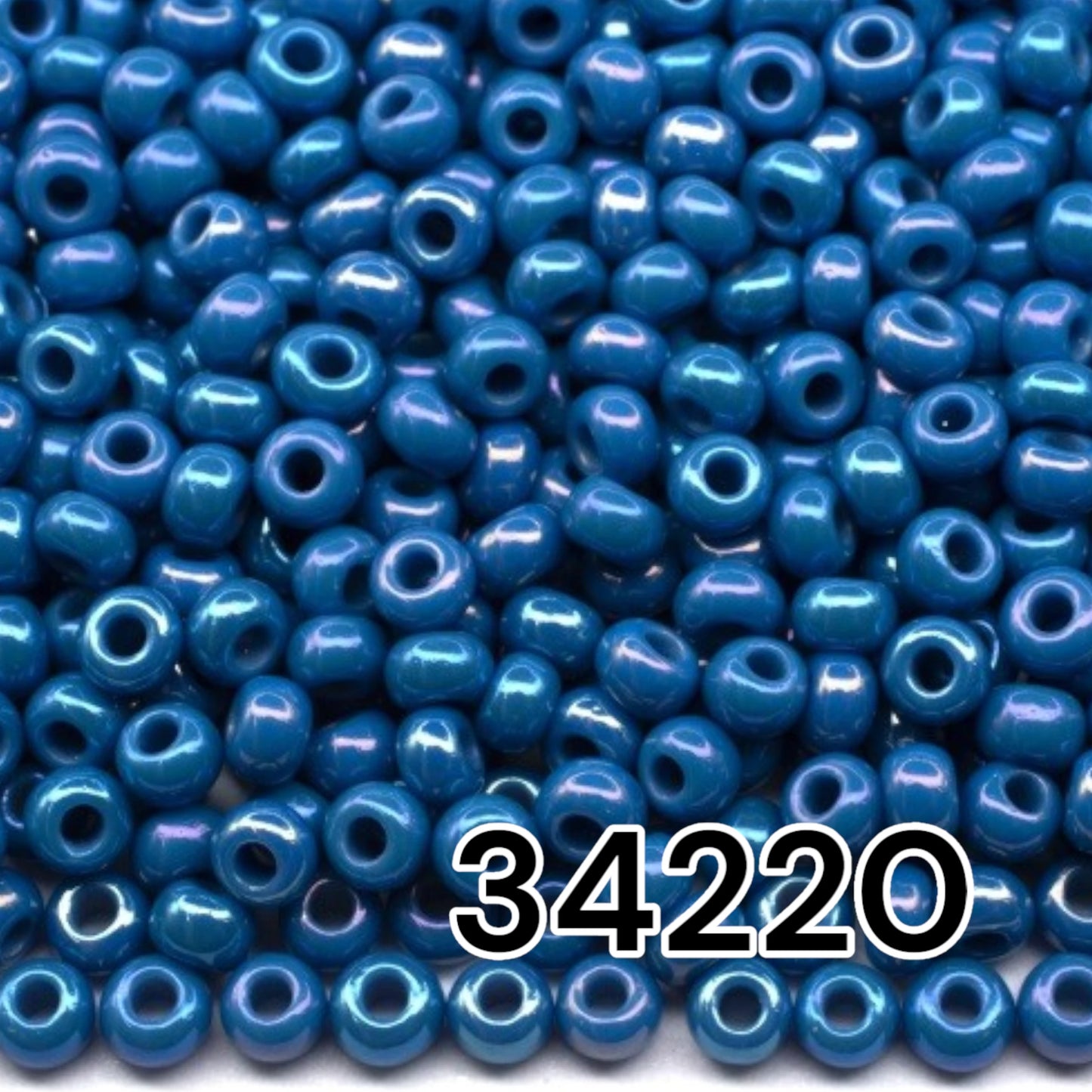 10/0 34220 Preciosa Czech Glass Seed Beads Rocailles 2.3mm. Opaque rainbow blue.