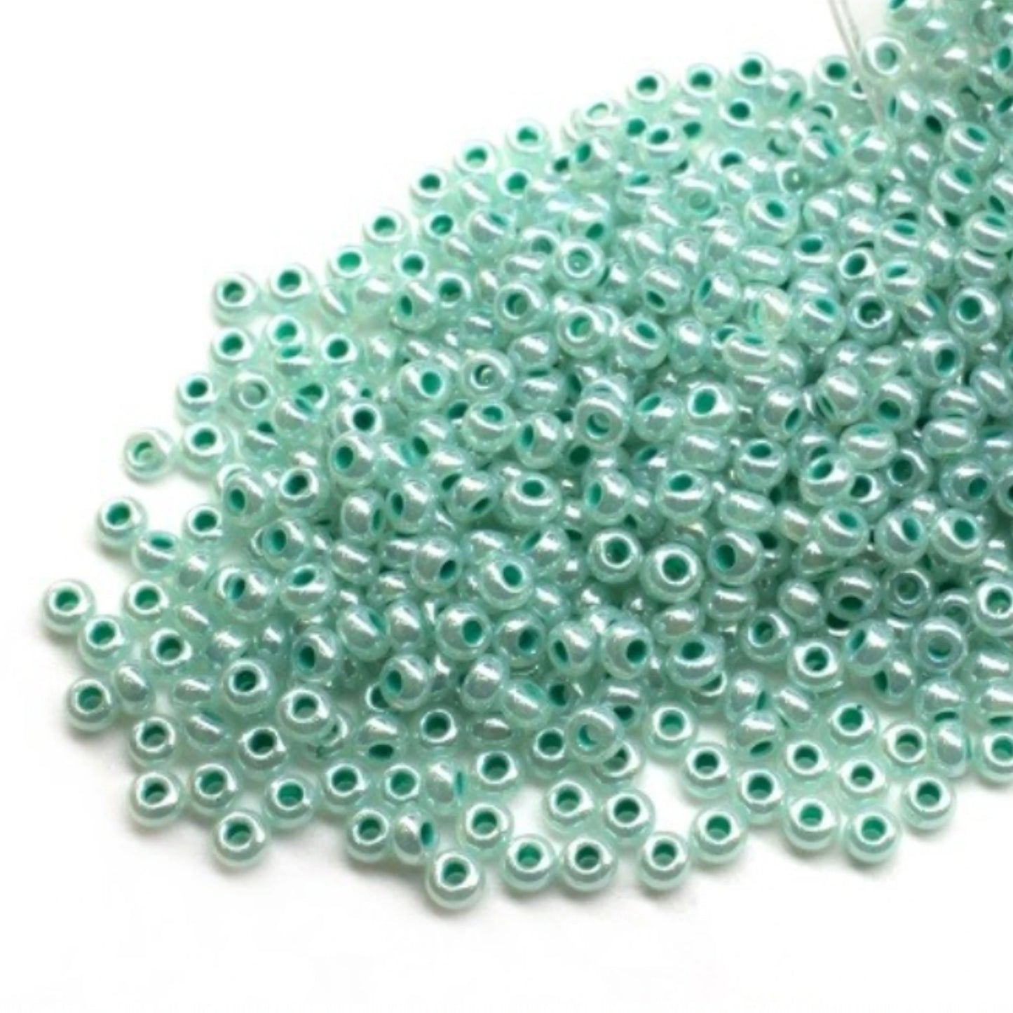 10/0 37358 Preciosa Czech Glass Seed Beads Rocailles 2.3mm. Ceylon Green - Sfinx Color Terra Lined