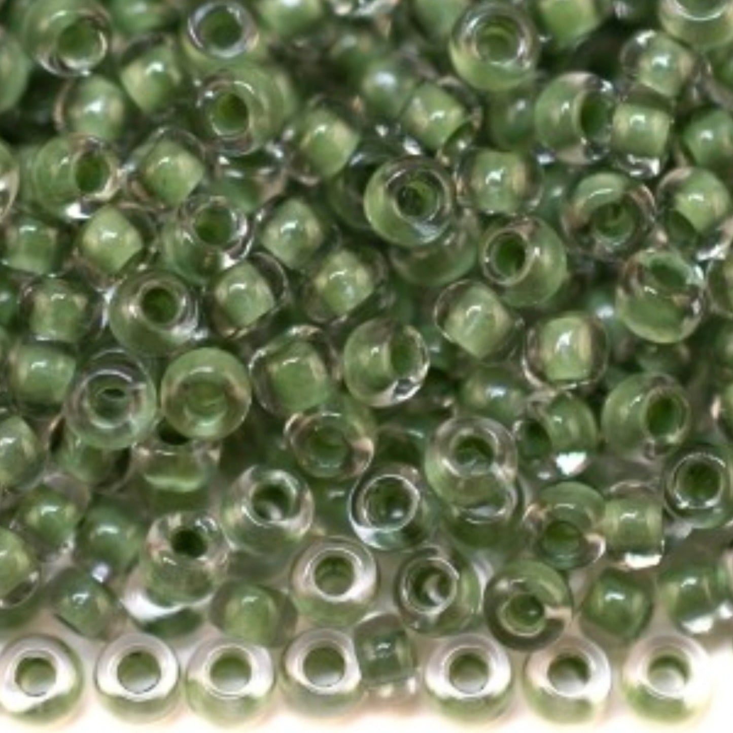 10/0 38359 Preciosa Чеський Скляний Бісер Рокайль 2.3 мм. Кришталевий Колір із Зеленим Покриттям.