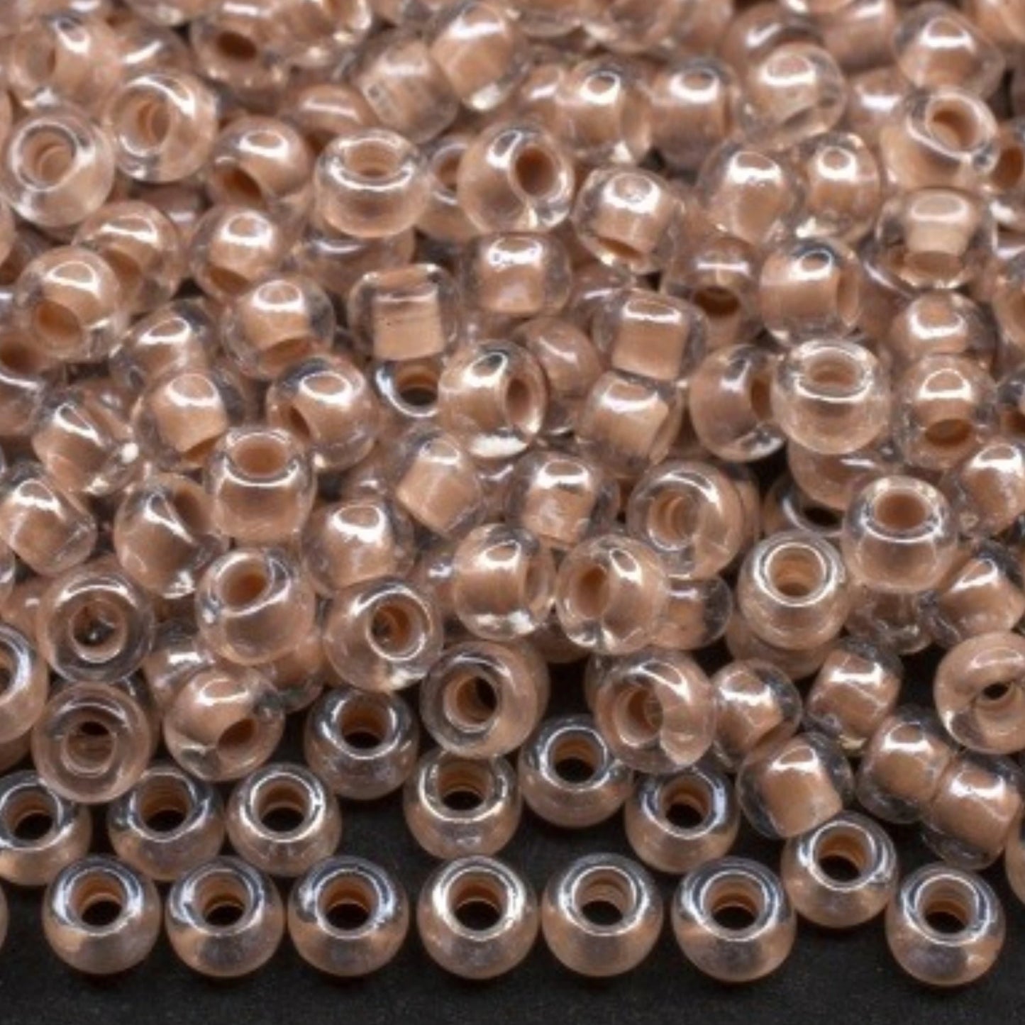 10/0 38617 Perles en verre tchèque Preciosa de Rocaille 2,3 mm. Couleur cristal bordée marron Sfinx.