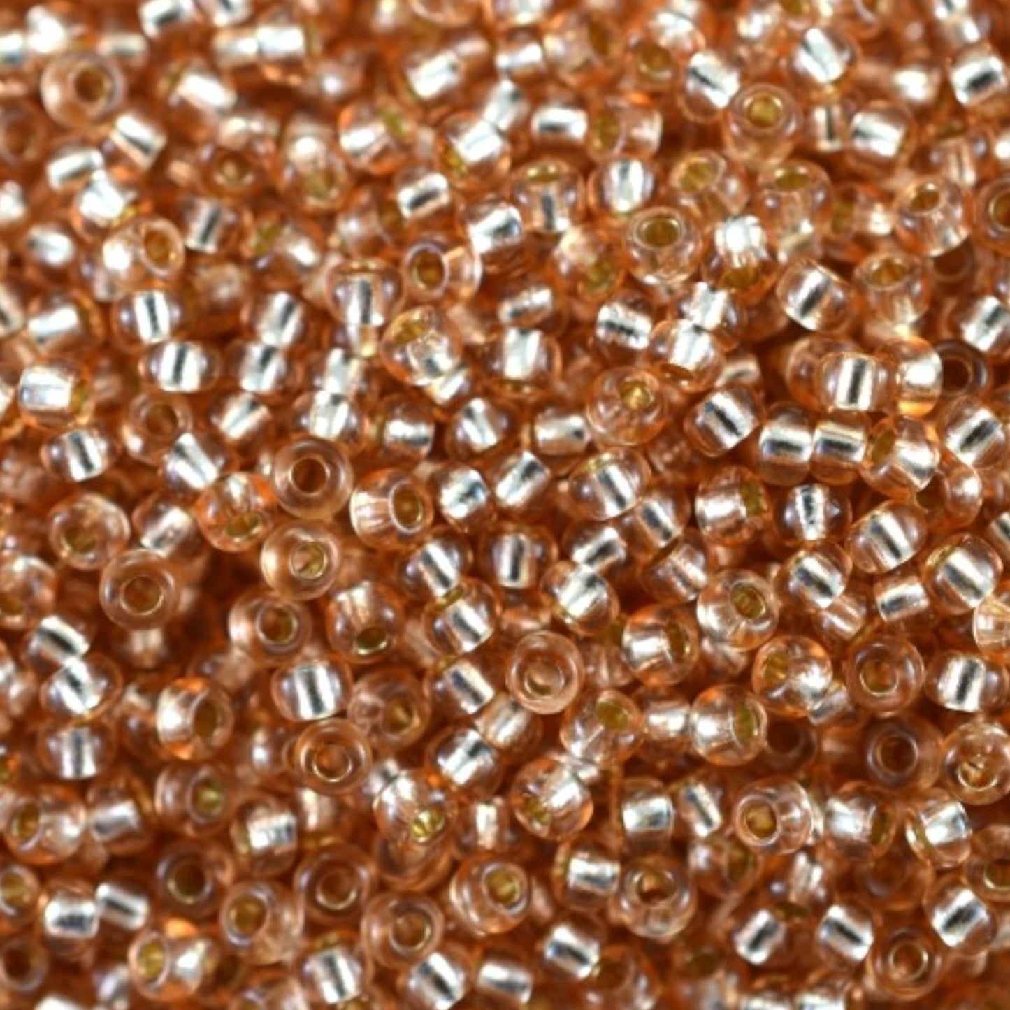 10/0 78185 Preciosa Czech Glass Perler Rocailles 2.3mm. Orange 2 farvet Krystal, Sølvbelagt.