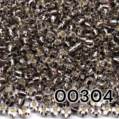 10/0 00304 Preciosa Seed Beads Rocailles. Crystal Striped Silver Lined.