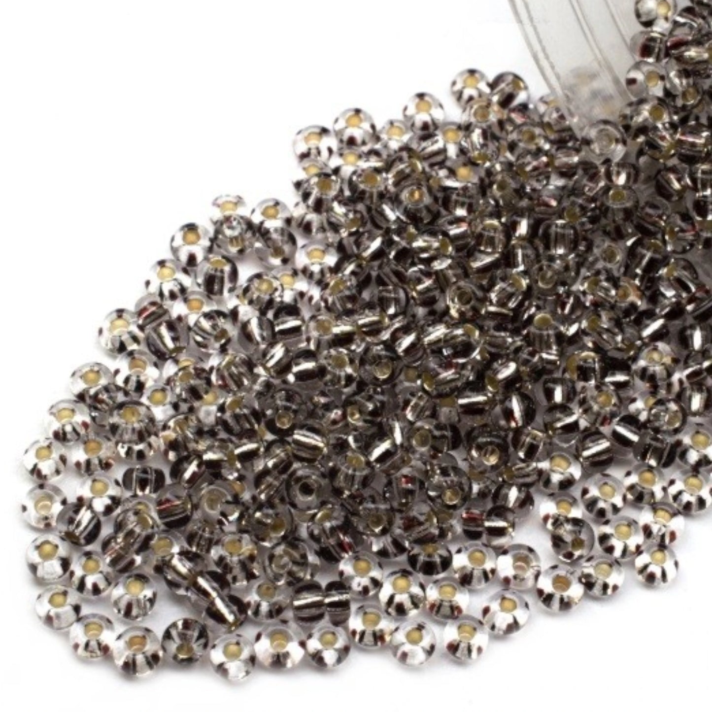 10/0 00304 Preciosa Seed Beads Rocailles. Crystal Striped Silver Lined.