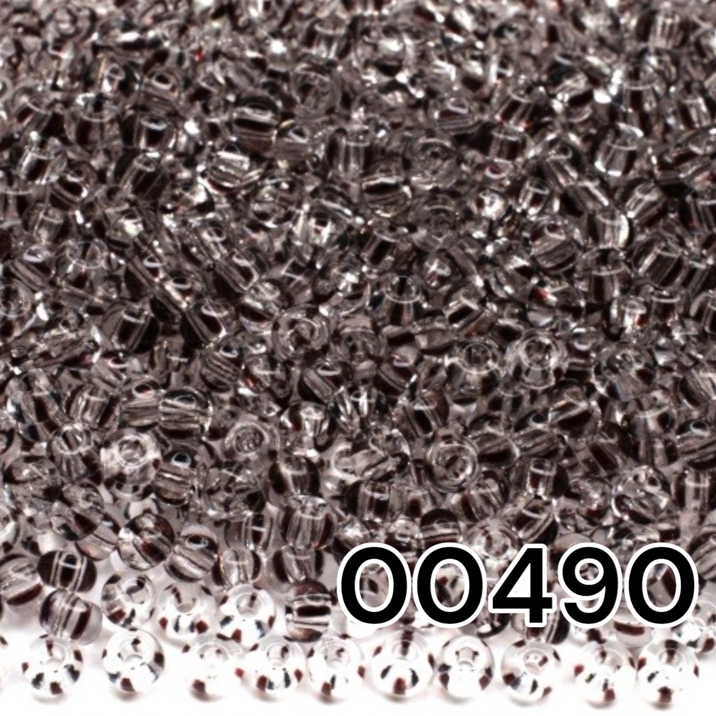 10/0 00490 Preciosa Seed Beads Rocailles. Crystal Striped.