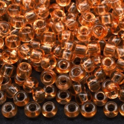 Perles de verre tchèque Preciosa 10/0 01185 de Rocaille 2,3 mm. Cristal orange - Teint Solgel.