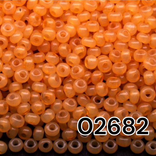 02682 Czech seed beads PRECIOSA round 10/0 orange. Alabaster - Solgel Dyed.