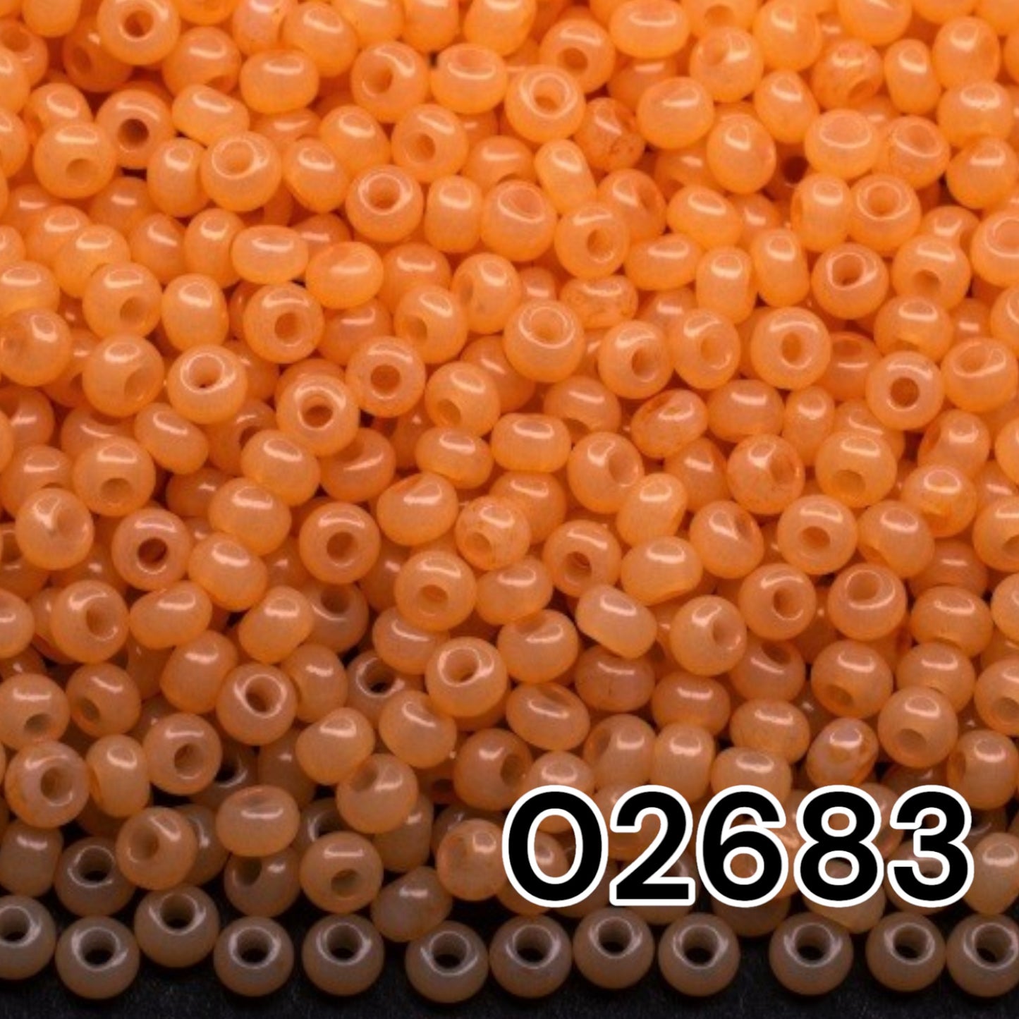02683 Tschechische Rocailles PRECIOSA rund 10/0 orange. Alabaster – Solgel-gefärbt.