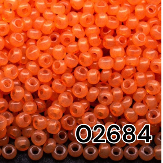 02684 Czech seed beads PRECIOSA round 10/0 orange peach. Alabaster - Solgel Dyed.