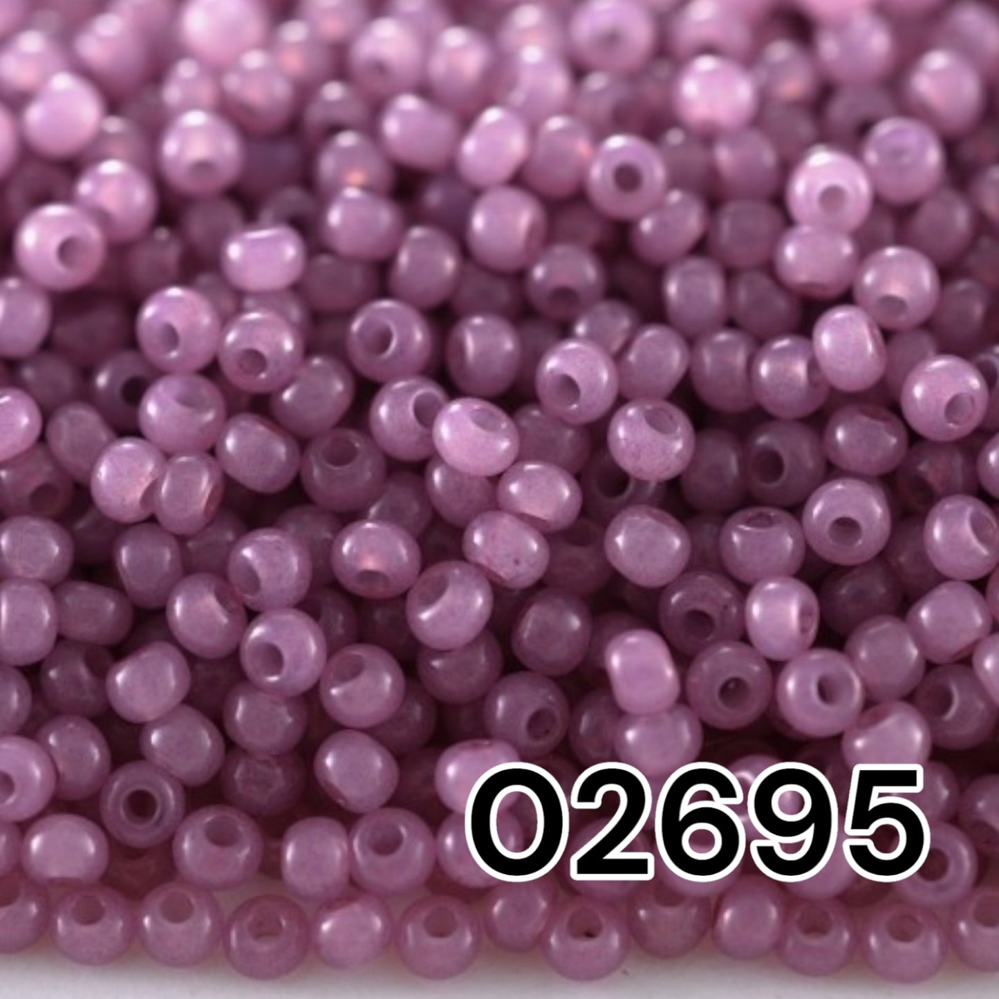 02695 Czech seed beads PRECIOSA round 10/0 amethyst. Alabaster - Solgel Dyed.