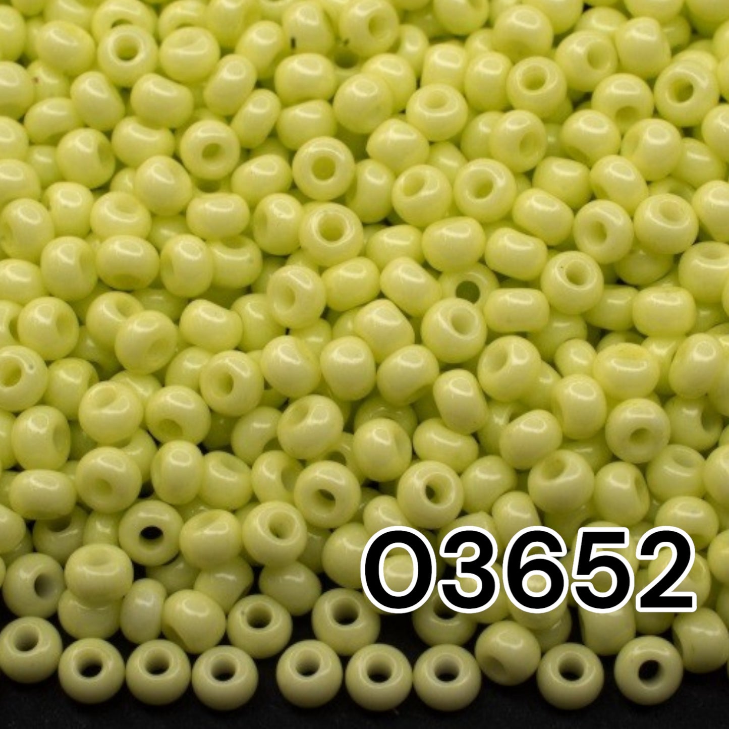 03652 Czech seed beads PRECIOSA round 10/0 light yellow green. Chalk - Solgel Dyed.