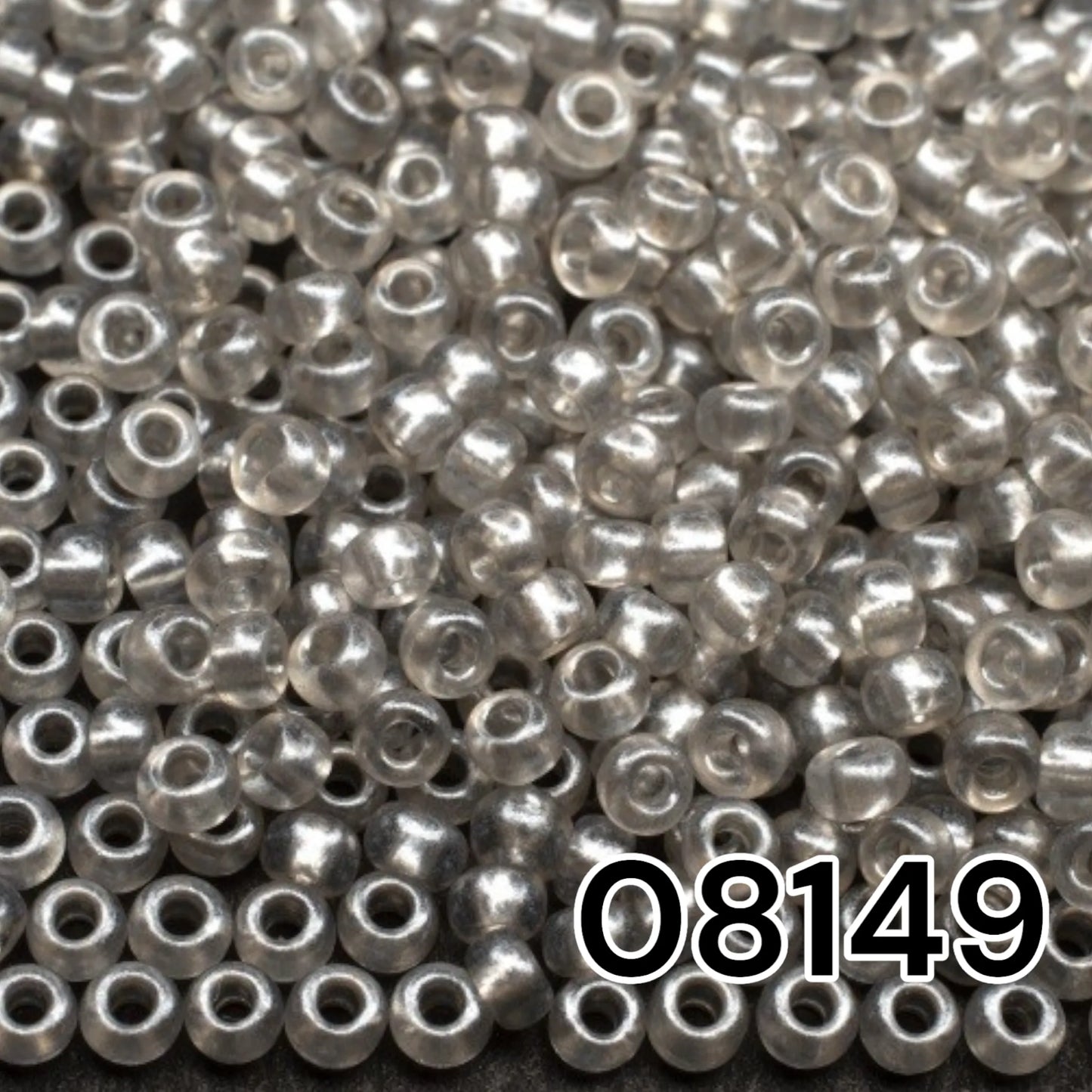 08149 Czech seed beads PRECIOSA Rocailles 10/0 grey. Crystal - Terra Pearl.