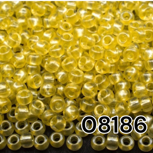 08186 Czech seed beads PRECIOSA Rocailles 10/0 yellow. Crystal - Terra Pearl.
