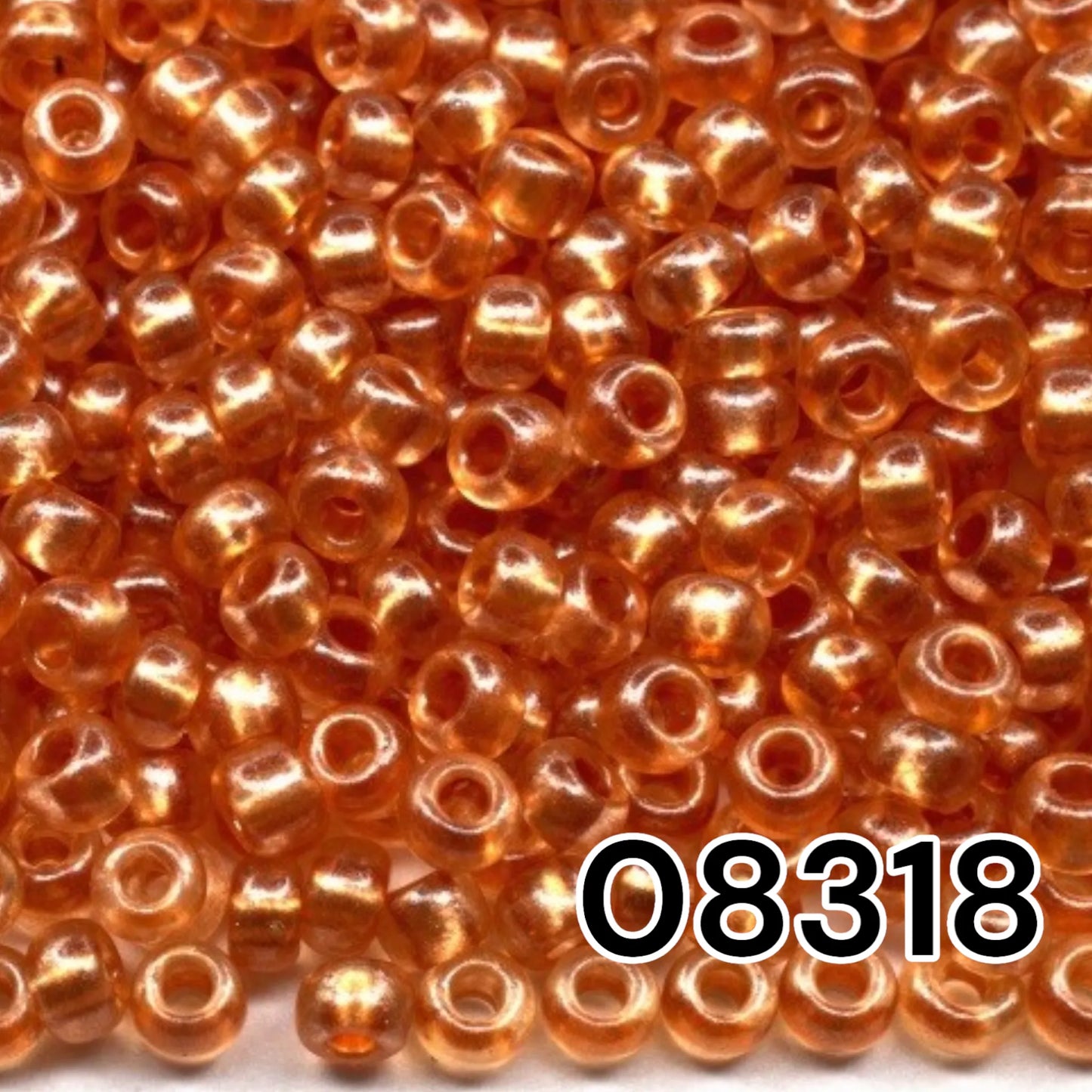 08318 Rocailles tchèques PRECIOSA Rocailles 10/0 marron orange. Cristal - Terra Perle.
