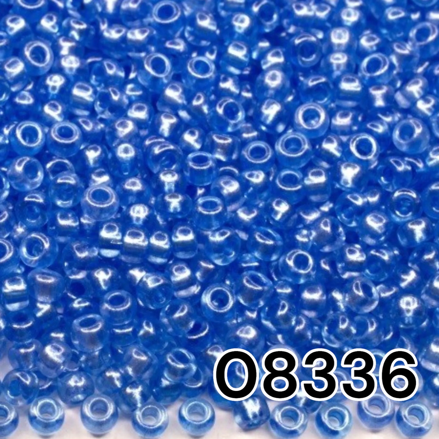 08336 Czech seed beads PRECIOSA Rocailles 10/0 light blue. Crystal - Terra Pearl.