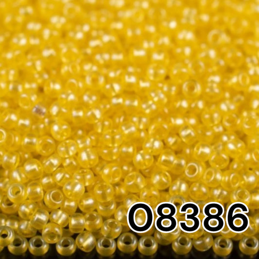 08386 Czech seed beads PRECIOSA Rocailles 10/0 yellow. Crystal - Terra Pearl.