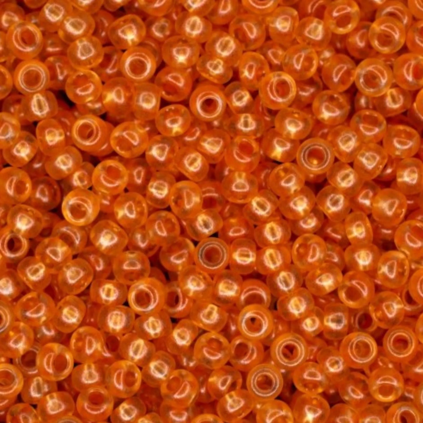 08392 Czech seed beads PRECIOSA Rocailles 10/0 orange. Crystal - Terra Pearl.