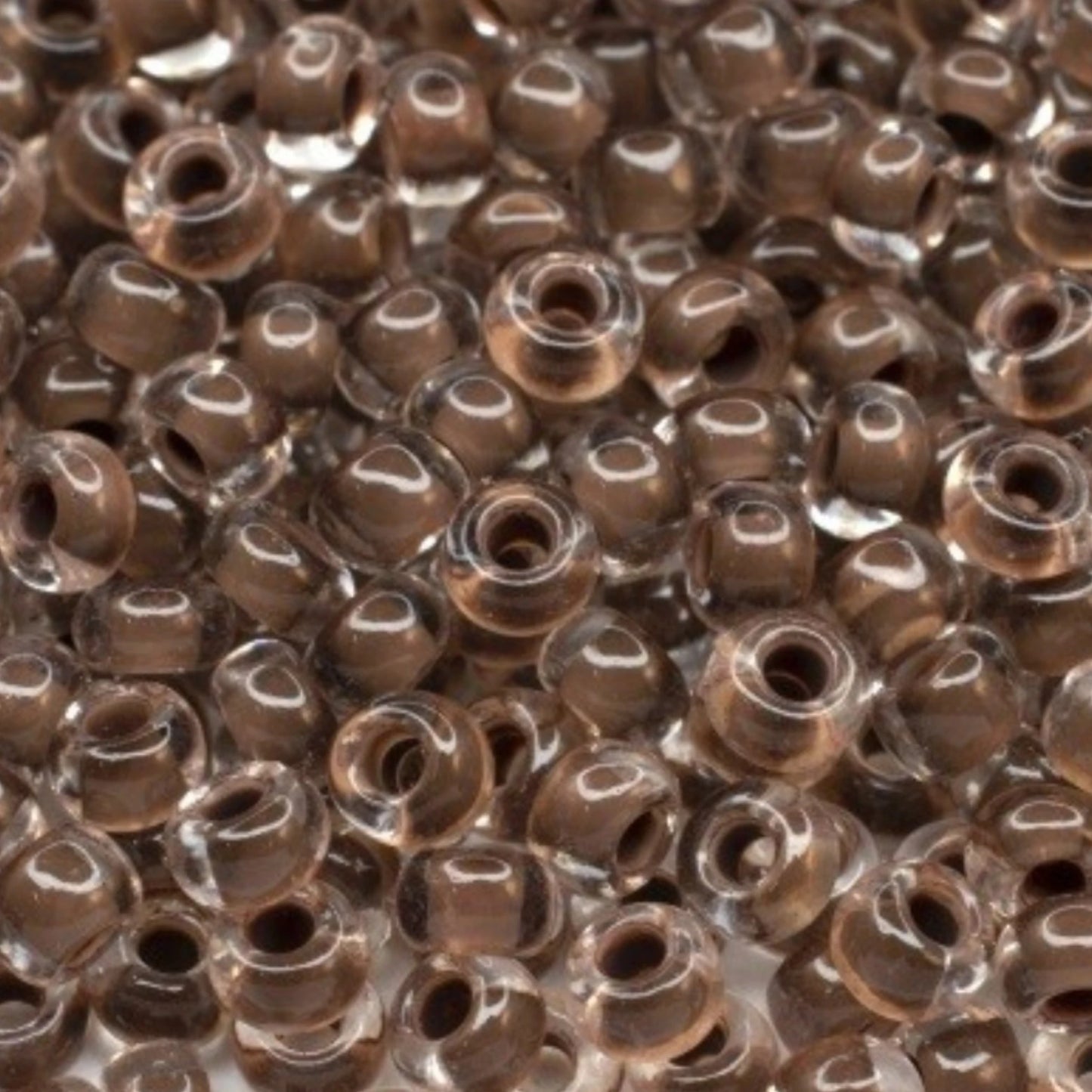 6/0 08A19 Preciosa Czech Glass Mărgele Rocaille 4.1mm. Crystal terra intensive dark brown lining.