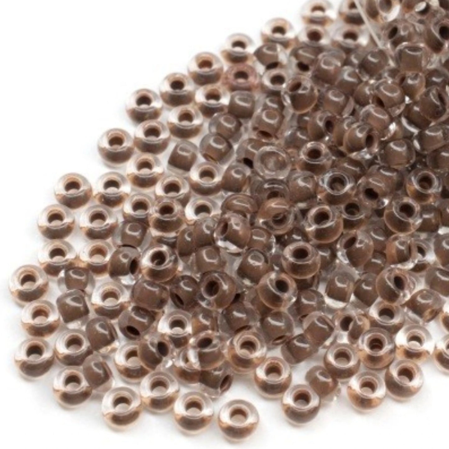 6/0 08A19 Preciosa Czech Glass Mărgele Rocaille 4.1mm. Crystal terra intensive dark brown lining.