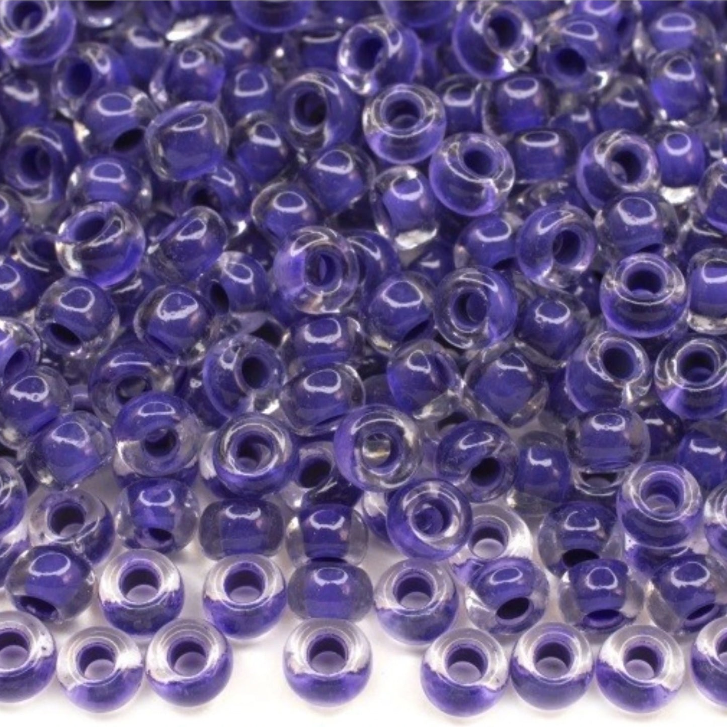 6/0 08A28 Preciosa Czech Glass Mărgele Rocaille 4.1mm. Crystal terra intensive violet lining.