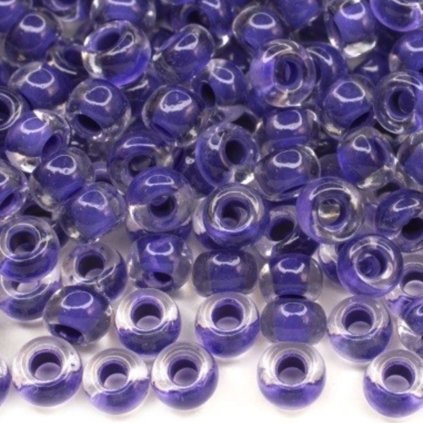 6/0 08A28 Preciosa Czech Glass Mărgele Rocaille 4.1mm. Crystal terra intensive violet lining.