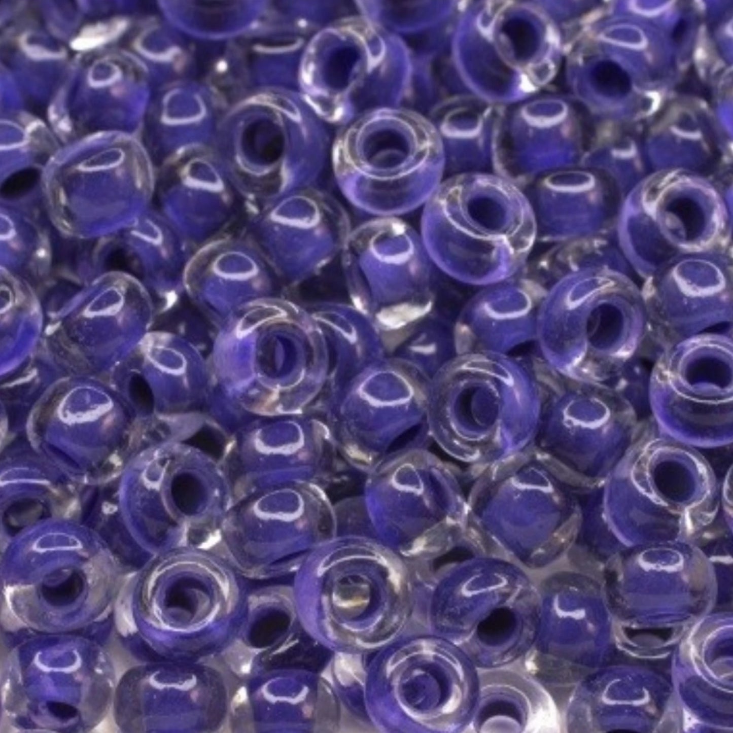 6/0 08A28 Preciosa Czech Glass Mărgele Rocaille 4.1mm. Crystal terra intensive violet lining.