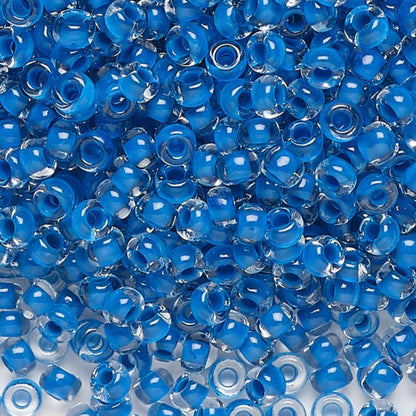 6/0 08A38 Preciosa Czech Glass Seed Beads Rocailles 4.1mm. Crystal terra intensive blue lining.