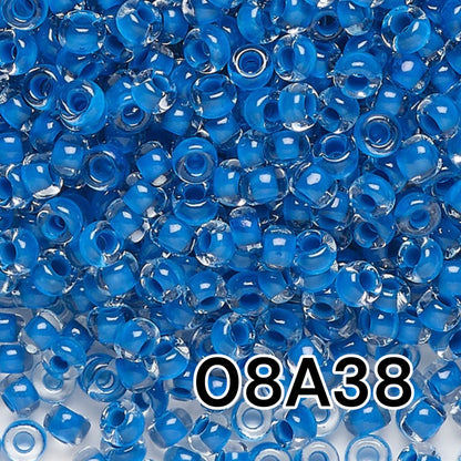 6/0 08A38 Preciosa Czech Glass Seed Beads Rocailles 4.1mm. Crystal terra intensive blue lining.