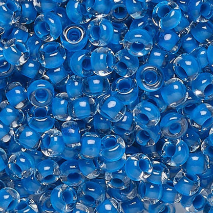 6/0 08A38 Preciosa Czech Glass Seed Beads Rocailles 4.1mm. Crystal terra intensive blue lining.