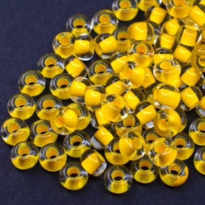 6/0 08A86 Preciosa Czech Glass Koraliki Rocailles 4.1mm. Kryształowe terra intensywne żółte wykończenie.