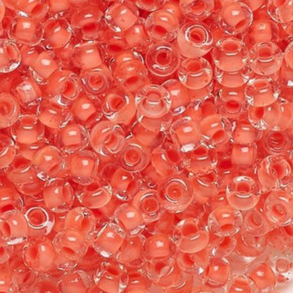 6/0 08A91 Preciosa Czech Glass Seed Beads Rocailles 4.1mm. Crystal terra intensive orange lining.