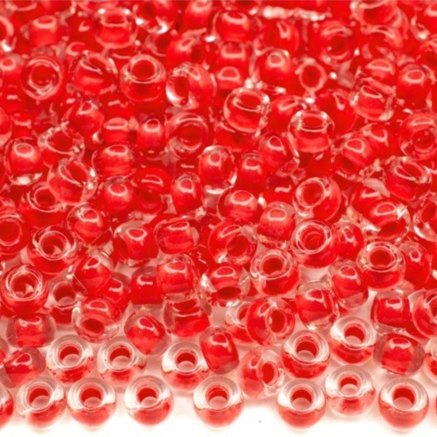 6/0 08A98 Preciosa Czech Glass Seed Beads Rocailles 4.1mm. Crystal terra intensive red lining.