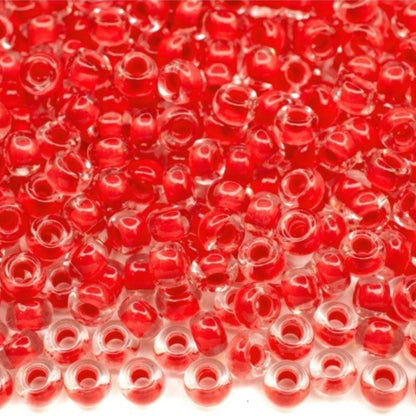6/0 08A98 Preciosa Czech Glass Seed Beads Rocailles 4.1mm. Crystal terra intensive red lining.