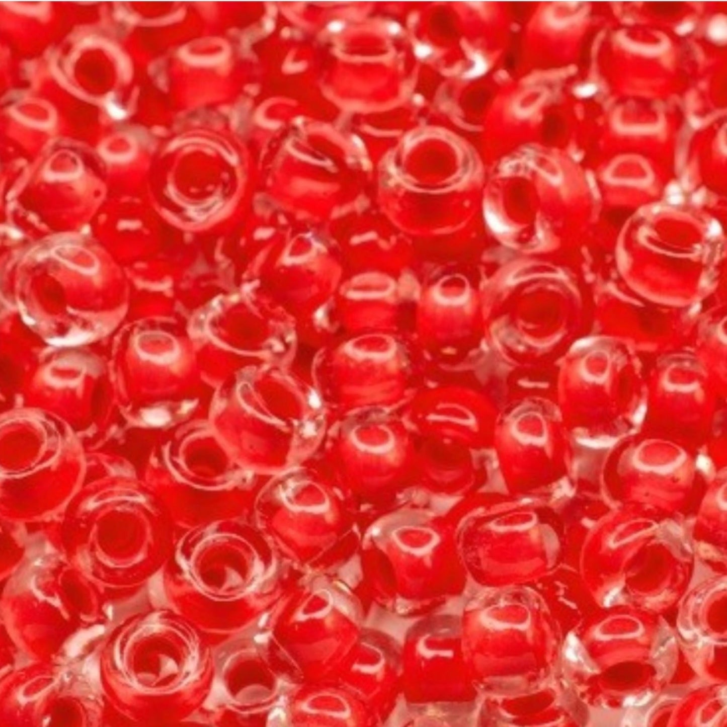 6/0 08A98 Preciosa Czech Glass Seed Beads Rocailles 4.1mm. Crystal terra intensive red lining.