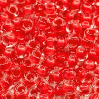 6/0 08A98 Preciosa Czech Glass Seed Beads Rocailles 4.1mm. Crystal terra intensive red lining.