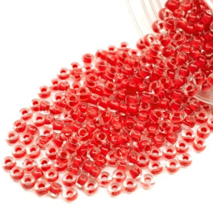 6/0 08A98 Preciosa Czech Glass Seed Beads Rocailles 4.1mm. Crystal terra intensive red lining.