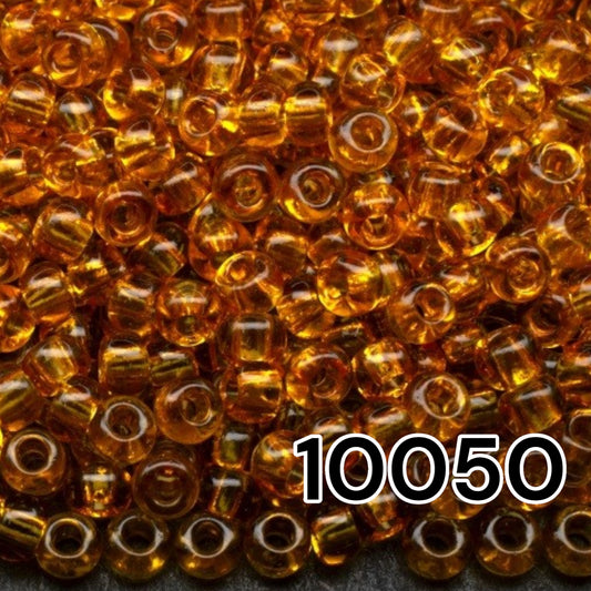 6/0 10050 Preciosa Seed Beads Yellow. Transparent Natural.