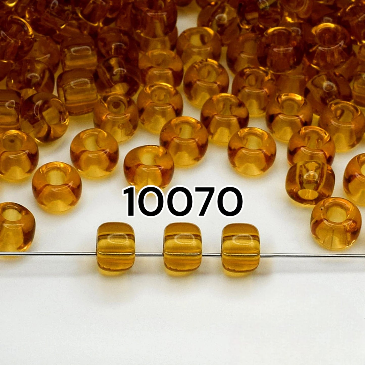 2/0 10070 Preciosa Czech Glass Seed Beads Rocailles 6.1mm. Yellow Brown Transparent natural.