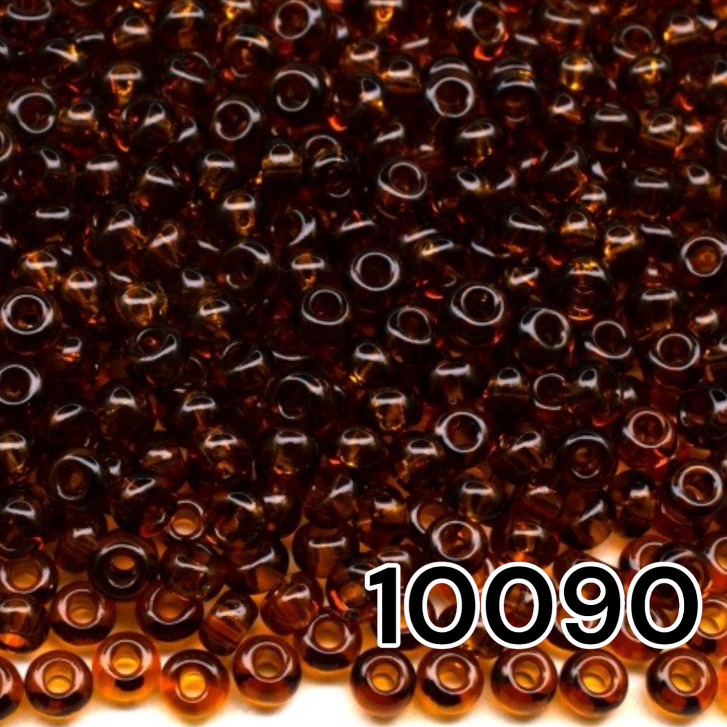10/0 10090 Preciosa Seed Beads. Brown Transparent natural.