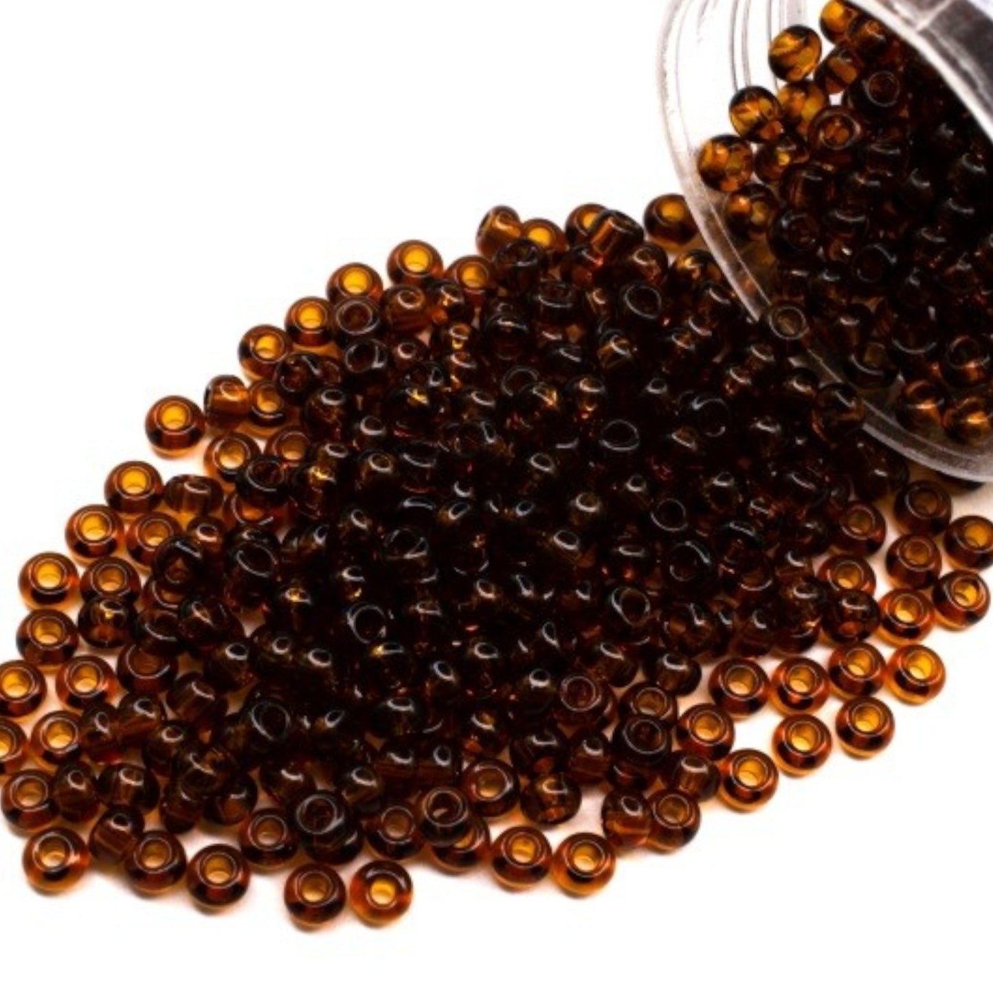 10/0 10090 Preciosa Seed Beads. Brown Transparent natural.