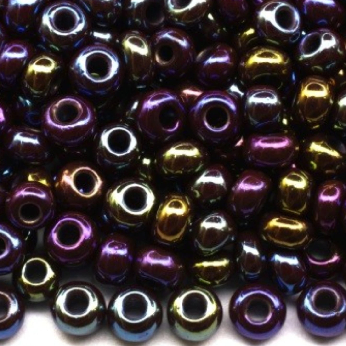 10/0 14780 Preciosa Czech Glass Seed Beads Rocailles 2.3mm. Opaque rainbow brown "tango".