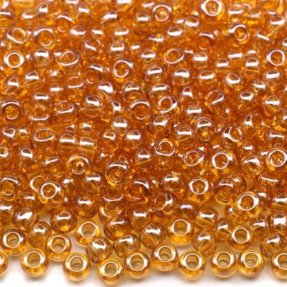 10/0 16050 Preciosa tjekkiske glasperler Perler Rocailles 2.3mm. Topas transparent Sfinx.