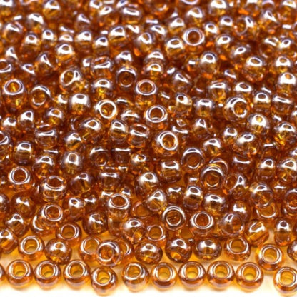 10/0 16090 Preciosa tschechische Glasperlen Rocailles 2.3mm. Topas transparent Sfinx.