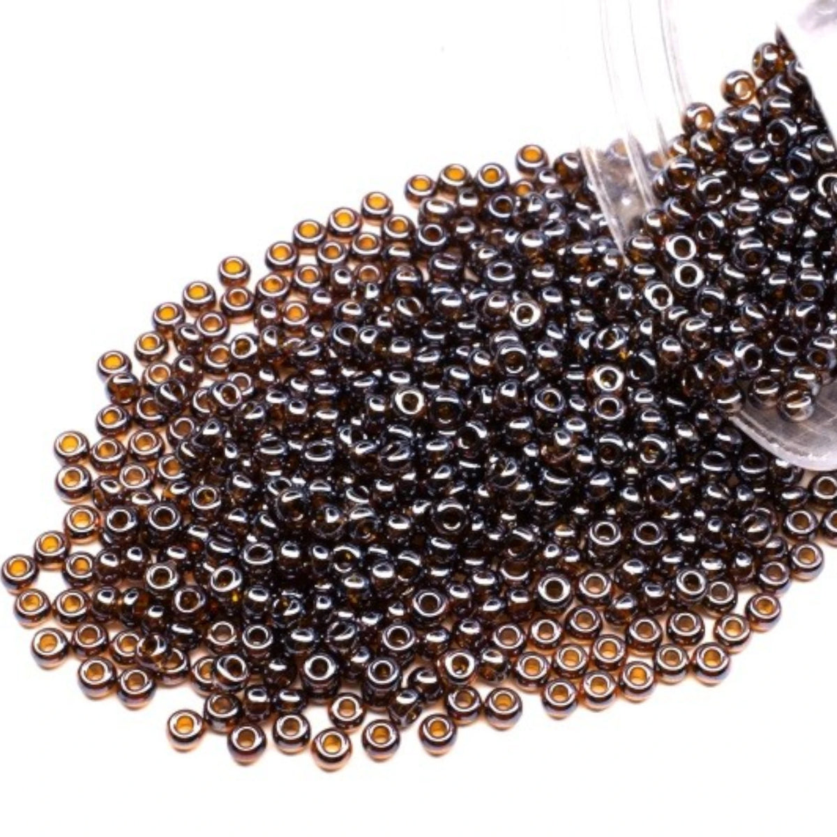 10/0 16110 Preciosa tjekkiske glasperler Rocailles 2.3mm. Gennemsigtig mørk topas Sfinx.