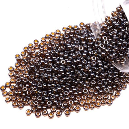 10/0 16110 Preciosa tjekkiske glasperler Rocailles 2.3mm. Gennemsigtig mørk topas Sfinx.