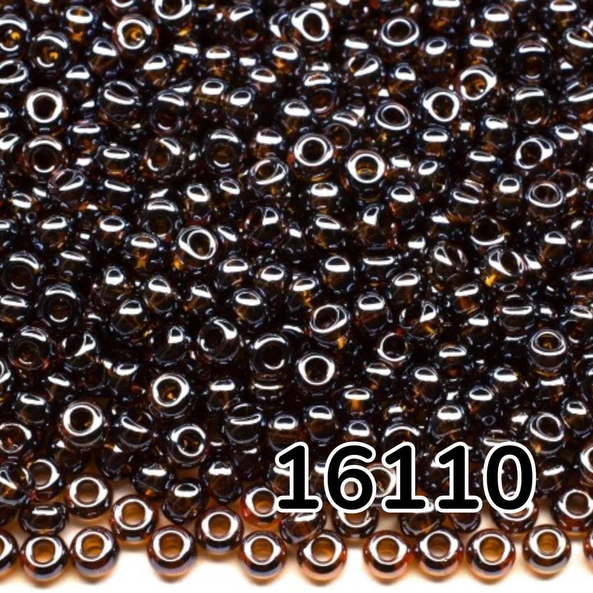 10/0 16110 Preciosa tjekkiske glasperler Rocailles 2.3mm. Gennemsigtig mørk topas Sfinx.