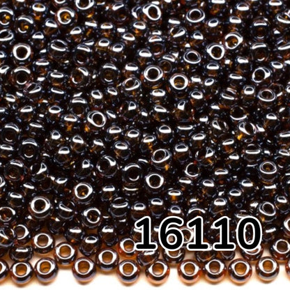 10/0 16110 Preciosa tjekkiske glasperler Rocailles 2.3mm. Gennemsigtig mørk topas Sfinx.