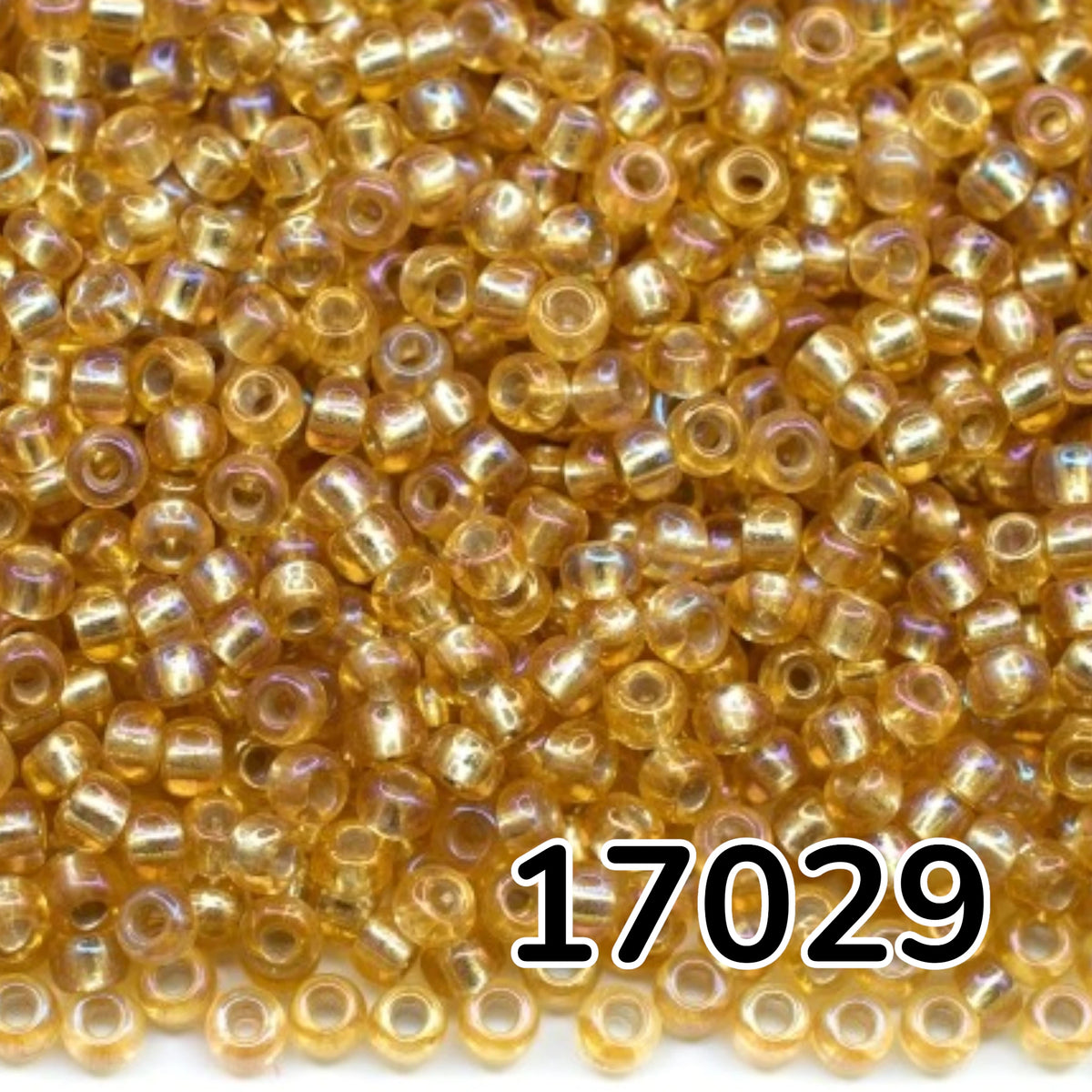 10/0 17029 Preciosa czeskie szklane Koraliki Rocailles 2.3mm. Jasny topaz, transparentne, posrebrzane, tęczowe.